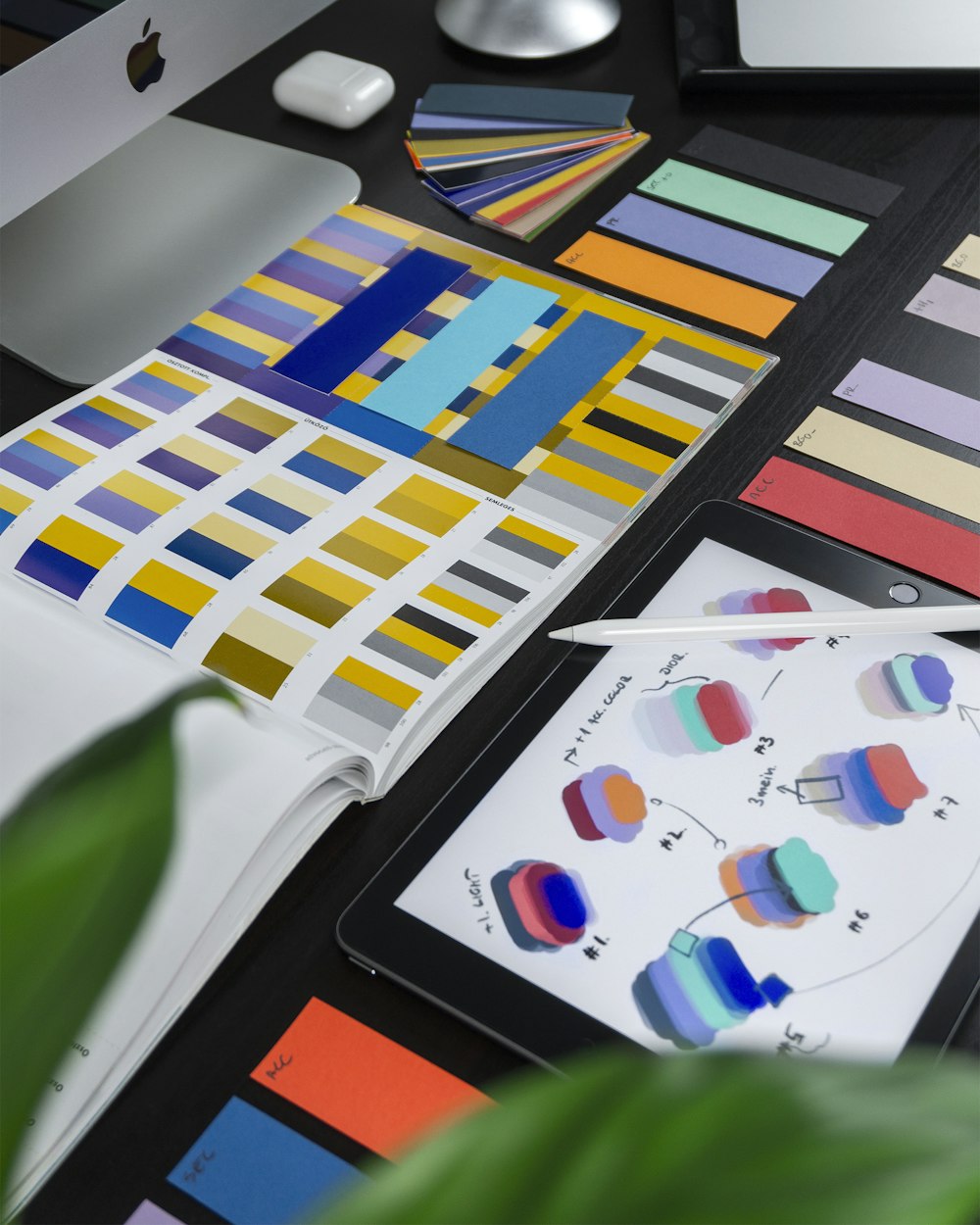 Colour swatches and palette studies in a web design studio